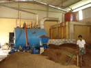 CRUSHED COCONUT BOILER WITH SCREW FEEDER